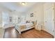 Charming bedroom with hardwood floors, ample natural light, and decorative wall decals at 2417 Siesta Ct, Marietta, GA 30062