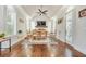 This dining room features hardwood floors, plantation shutters, a fireplace, and vaulted ceilings at 2417 Siesta Ct, Marietta, GA 30062