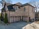 Elegant brick home with a three-car garage and beautifully landscaped grounds, offering both style and functionality at 2417 Siesta Ct, Marietta, GA 30062