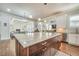 Open kitchen layout with center island, granite countertops, and view to the living area at 2417 Siesta Ct, Marietta, GA 30062