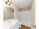 Bright bathroom with white vanity, tub and shower, complete with modern fixtures at 499 Bellbrook Ln, Lawrenceville, GA 30045