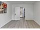 Bright bedroom featuring light gray floors and a painting for a cozy and modern interior at 5393 Ridge Forest Dr, Stone Mountain, GA 30083