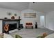 Bright living room boasts sleek fireplace, neutral walls, and stylish decor at 5393 Ridge Forest Dr, Stone Mountain, GA 30083