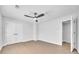 Bedroom featuring a ceiling fan, hardwood style floors, and a double door closet at 609 Old Wheat Ne St, Atlanta, GA 30312