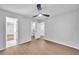 Bright bedroom featuring hardwood style flooring and a doorway to another room at 609 Old Wheat Ne St, Atlanta, GA 30312