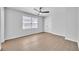 Bedroom featuring hardwood floors, a ceiling fan, and a double door closet at 609 Old Wheat Ne St, Atlanta, GA 30312