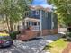 Beautiful two-story home featuring a covered porch, brick foundation, and an ample driveway at 609 Old Wheat Ne St, Atlanta, GA 30312