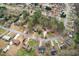 Overhead view of a neighborhood featuring mature trees and well-maintained homes on landscaped lots at 1542 Bogota Way, Jonesboro, GA 30236