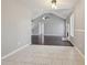 Inviting dining area showcasing tiled floors and an open flow into the adjacent living room at 1542 Bogota Way, Jonesboro, GA 30236