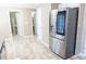 Spacious kitchen featuring stainless steel appliances and a stainless steel refrigerator at 3045 Arden Ridge Dr, Suwanee, GA 30024