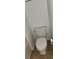 A standard toilet featuring tile floors and white walls at 3512 Clear Creek Crossing, Kennesaw, GA 30144