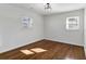 Sunlit bedroom with hardwood floors and neutral paint providing a blank canvas at 629 Moselle Sw Dr, Mableton, GA 30126