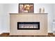 Contemporary fireplace design with a decorative mantle adding warmth to the interior at 629 Moselle Sw Dr, Mableton, GA 30126