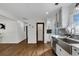 Bright kitchen with farmhouse sink and pantry perfect for storage and entertaining at 629 Moselle Sw Dr, Mableton, GA 30126