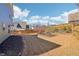 The fenced backyard includes a landscaped garden at 3255 Blackburn Dr, Cumming, GA 30040