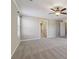Large bedroom with neutral carpet, natural light, and ensuite access at 3255 Blackburn Dr, Cumming, GA 30040