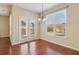 Dining area with hardwood floors, a chandelier and natural light at 3255 Blackburn Dr, Cumming, GA 30040