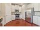Kitchen with stainless appliances and white cabinetry at 3255 Blackburn Dr, Cumming, GA 30040