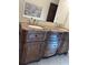 Elegant bathroom vanity with double sinks, marble countertop, and decorative wood cabinetry at 2894 Dellinger Dr, Marietta, GA 30062