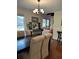 Elegant dining room with chandelier, table with seating for six, and hardwood floors at 2894 Dellinger Dr, Marietta, GA 30062