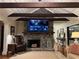 Inviting living room with stone fireplace and ceiling beams at 2894 Dellinger Dr, Marietta, GA 30062