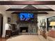 Cozy living room with a stone fireplace and wooden beams at 2894 Dellinger Dr, Marietta, GA 30062