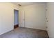 Cozy bedroom featuring neutral-colored walls and carpeted floors for comfortable living at 5150 Rockford Ln, Stockbridge, GA 30281