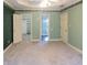 View of the main bedroom revealing entry to a walk-in closet and an en-suite bathroom with shower and tub at 5150 Rockford Ln, Stockbridge, GA 30281