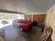 Spacious carport with red truck and other vehicles at 5744 Amalfi Way, Douglasville, GA 30135