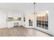 Bright breakfast nook features built in cabinets, desk, and large windows at 816 Ivy Ridge Dr, Loganville, GA 30052