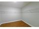 Walk-in closet boasts ample storage space with shelving, offering organization and convenience at 2143 Lyle Ave, College Park, GA 30337