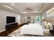 Spacious bedroom offers a ceiling fan, recessed lighting and a cozy layout for relaxation at 2143 Lyle Ave, College Park, GA 30337
