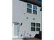 Exterior of the home, showing siding, windows, door, and ADT security at 2633 Coventry Sw St, Atlanta, GA 30331