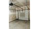 Spacious garage with concrete floor, ready to park your vehicles or store belongings at 2633 Coventry Sw St, Atlanta, GA 30331