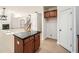 Kitchen area with stainless steel appliances, an island and plenty of storage space at 379 Peachstone Way, Lawrenceville, GA 30043