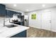 Well-lit kitchen featuring stainless steel appliances and granite countertops at 4739 Cook Sw Rd, Stockbridge, GA 30281