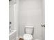 A standard bathroom with a white toilet, shower and tub combo; ready for your personal touches at 4825 Layton Drive, Lithia Springs, GA 30122