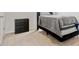 Cozy bedroom featuring plush carpeting, neutral paint, and dark furniture at 4825 Layton Drive, Lithia Springs, GA 30122