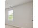 Bright bedroom features a window providing natural light and neutral colored walls at 4825 Layton Drive, Lithia Springs, GA 30122