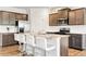 Well-equipped kitchen featuring granite countertops, stainless steel appliances, and a modern design at 4825 Layton Drive, Lithia Springs, GA 30122