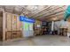 Unfinished basement featuring bare framing, a door to the outside, and ample storage space at 1351 Ashbury Park Dr, Hoschton, GA 30548