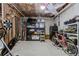 Spacious unfinished basement great for storage, with sporting equipment, storage shelves and overhead lighting at 1351 Ashbury Park Dr, Hoschton, GA 30548