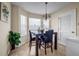 Cozy breakfast nook with natural light, a modern table, and a plant at 6031 Autumn Green Dr, Fairburn, GA 30213