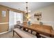 Bright dining room with a wooden table set and natural light at 6031 Autumn Green Dr, Fairburn, GA 30213