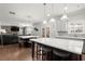 Open concept eat-in kitchen flows into living room at 4316 Woodland Bank Blvd, Buford, GA 30518