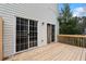 Back deck featuring sliding glass doors, perfect for outdoor entertaining and relaxation at 700 Celeste Sw Ln, Atlanta, GA 30331