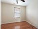 Bedroom with laminate floors, window, and neutral walls at 700 Celeste Sw Ln, Atlanta, GA 30331
