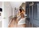 Inviting entryway with wood-look tile flooring and staircase at 700 Celeste Sw Ln, Atlanta, GA 30331