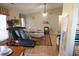 Bright living room with vaulted ceilings, a cozy sofa, and natural light at 985 Orchard Mill Ct, Lawrenceville, GA 30043