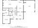 Main floor plan showing layout of rooms, including living room, kitchen, primary bedroom, and garage at 101 Hardwood Ln, Canton, GA 30115